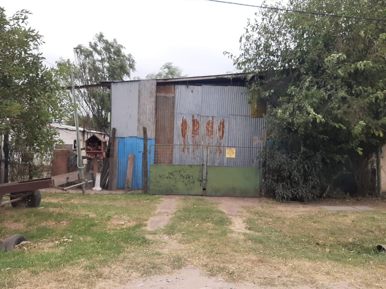 terreno con construccion