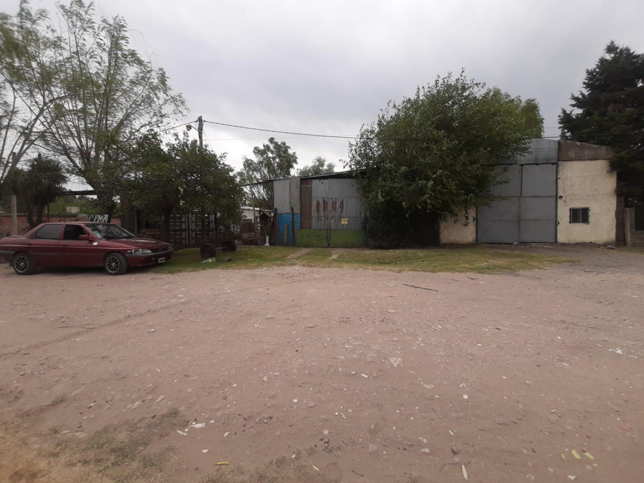 terreno con construccion